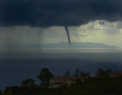 Photo of home perched on Latigo Canyon road with with view of One of Two water spouts about 2-miles off the coast of Pepperdine in Malibu Wednesday afternoon bringing in heavy rain to the area. The other water spout was spotted in the Point Dume Area.  October 27, 2004. (LOS ANGELES TIMES PHOTO BY KEN HIVELY)